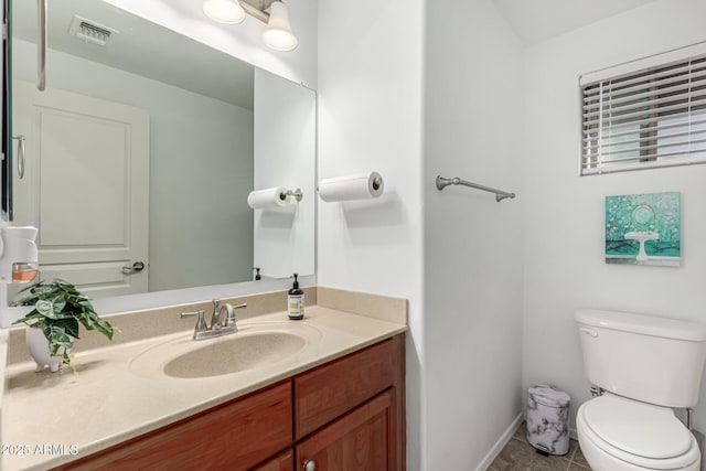 21472 E Saddle Ct, Queen Creek, AZ 85142 - half bath with toilet, vanity, tile patterned flooring, and baseboards