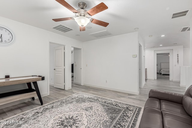 21472 E Saddle Ct, Queen Creek, AZ 85142 - living area featuring light wood finished floors, ceiling fan, baseboards, and recessed lighting