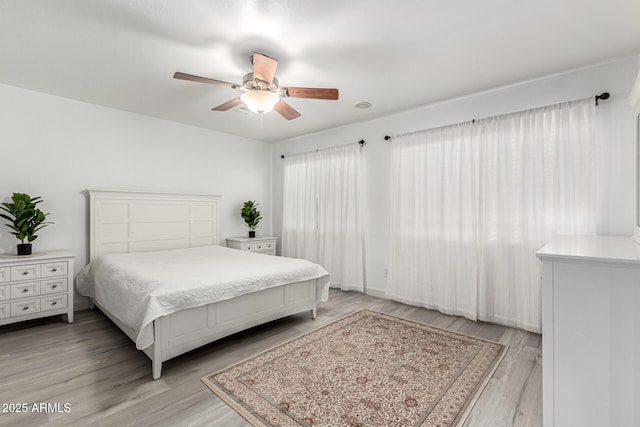 21472 E Saddle Ct, Queen Creek, AZ 85142 - bedroom featuring light wood-style floors and ceiling fan