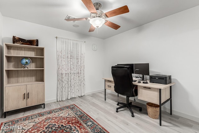 21472 E Saddle Ct, Queen Creek, AZ 85142 - office with light wood-type flooring, baseboards, and ceiling fan