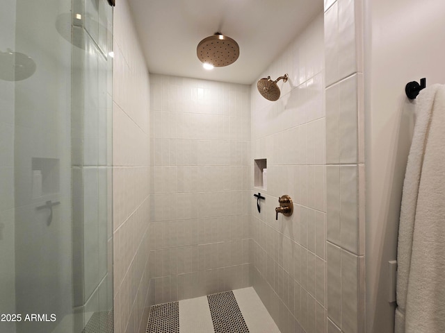 full bath featuring a shower stall