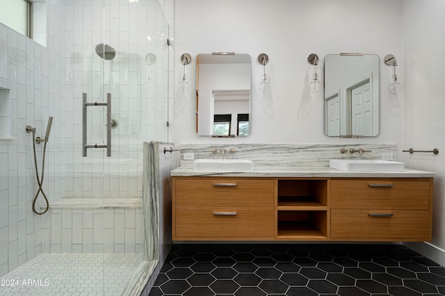 bathroom featuring vanity, tile patterned floors, and an enclosed shower