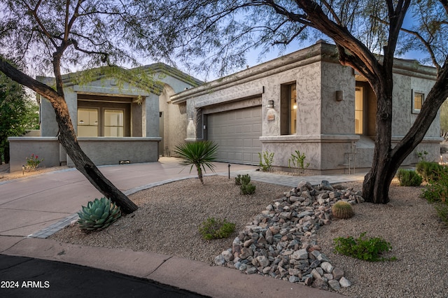 view of front of property featuring a garage