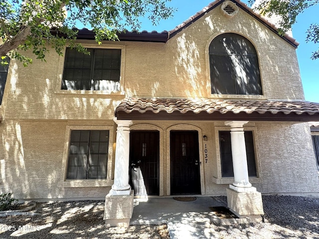 921 W University Dr Unit 1038, Mesa, AZ 85201 - view of front of property featuring stucco siding and a tiled roof