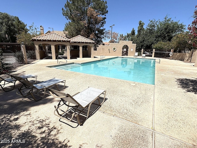 921 W University Dr Unit 1038, Mesa, AZ 85201 - community pool with fence and a patio area