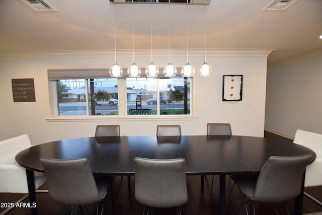 dining room with ornamental molding