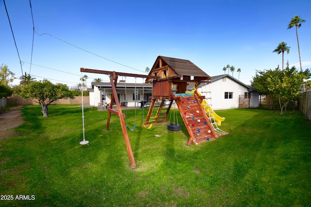 view of jungle gym with a yard