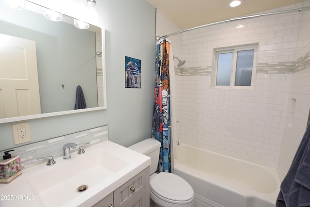 full bathroom featuring toilet, shower / bathtub combination with curtain, tasteful backsplash, and vanity