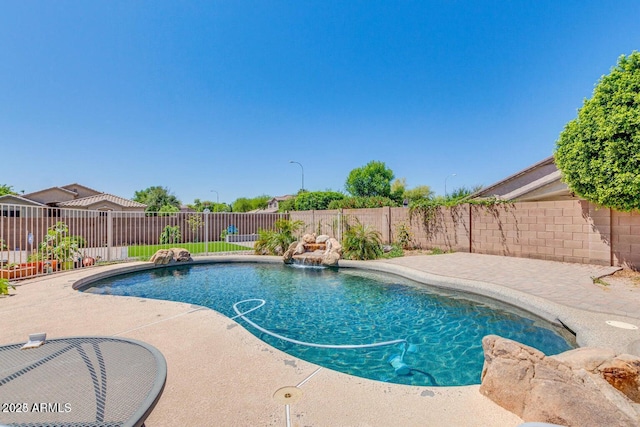 view of swimming pool featuring pool water feature