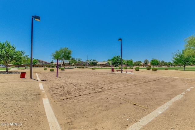 surrounding community featuring volleyball court