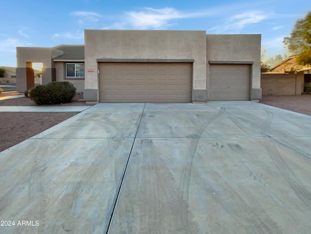 adobe home with a garage