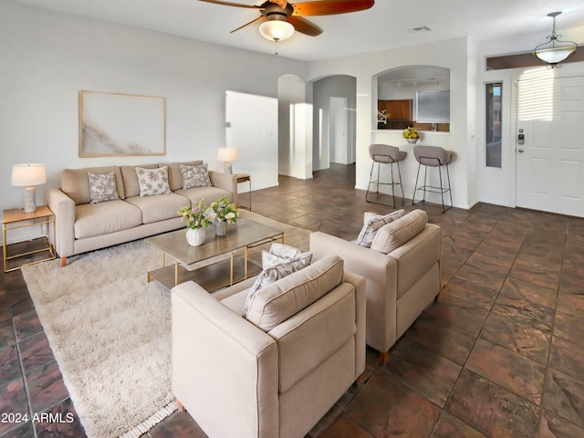 living room with ceiling fan