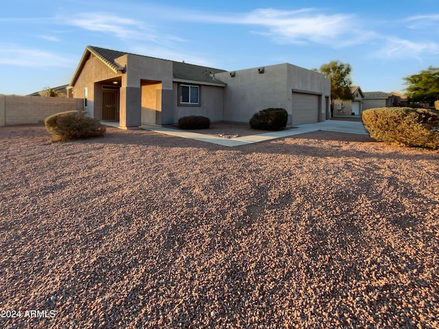 view of front of property featuring a garage