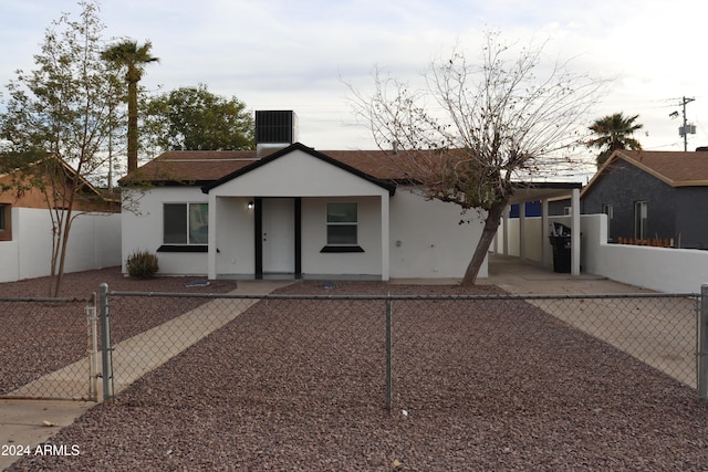 single story home featuring a porch and cooling unit