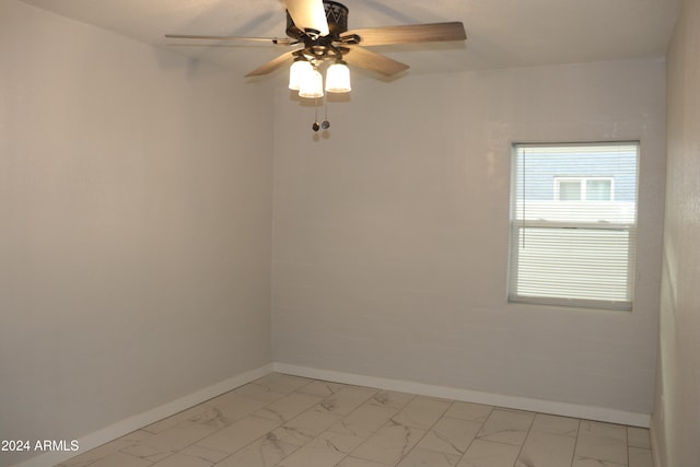 empty room featuring ceiling fan