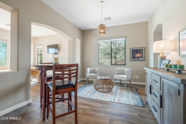 living area with dark hardwood / wood-style flooring