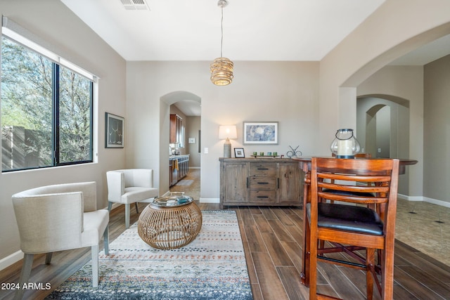 living area featuring dark hardwood / wood-style floors