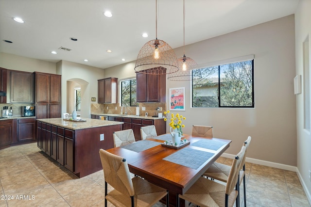 tiled dining area with sink