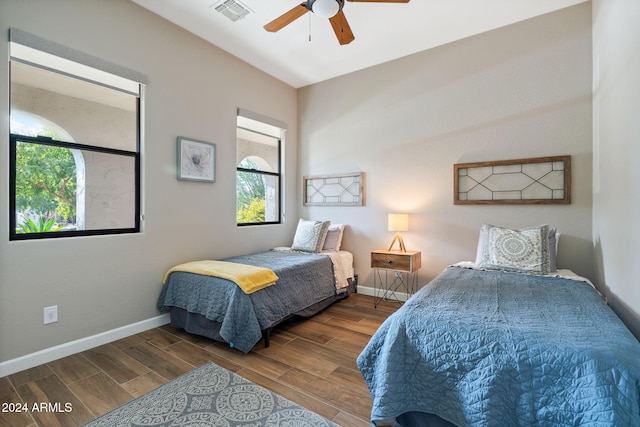 bedroom featuring ceiling fan and wood-type flooring