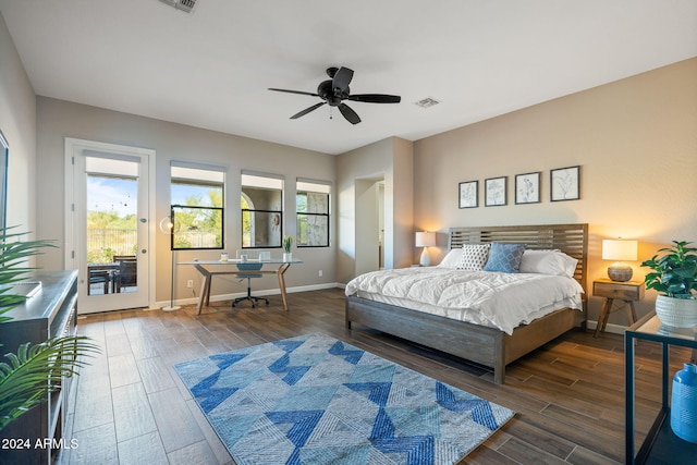 bedroom with access to outside, ceiling fan, and dark wood-type flooring