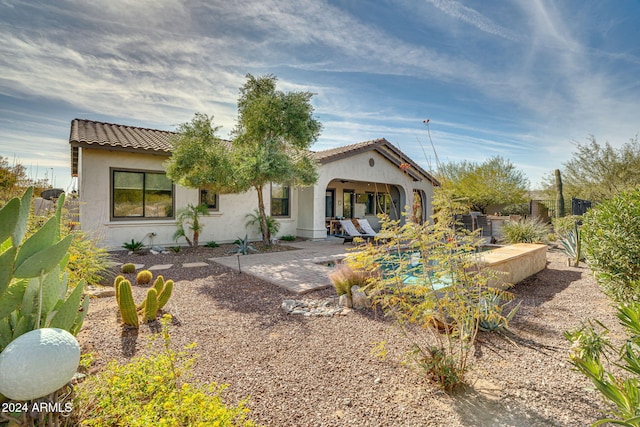 view of front facade with a patio