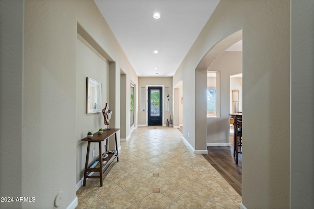 entryway with light hardwood / wood-style floors