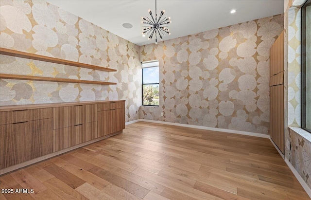 5301 N 43rd St, Phoenix, AZ 85018 - unfurnished dining area with wallpapered walls, a chandelier, light wood-type flooring, and recessed lighting