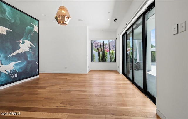 5301 N 43rd St, Phoenix, AZ 85018 - empty room with light wood-type flooring and baseboards