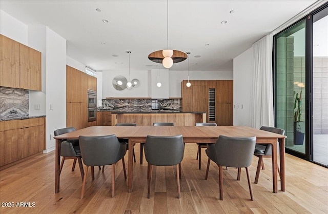5301 N 43rd St, Phoenix, AZ 85018 - dining space with light wood-style floors