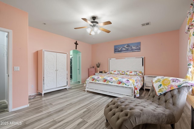 bedroom featuring light wood-type flooring and ceiling fan