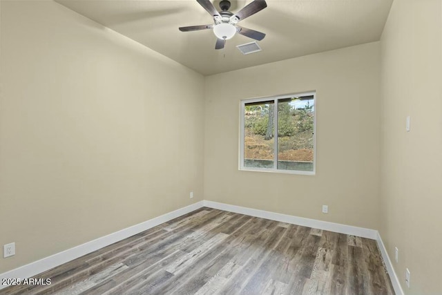 1910 E Rainbow Trl, Payson, AZ 85541 - spare room with visible vents, ceiling fan, baseboards, and wood finished floors
