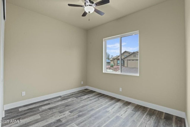 1910 E Rainbow Trl, Payson, AZ 85541 - empty room featuring ceiling fan, wood finished floors, and baseboards