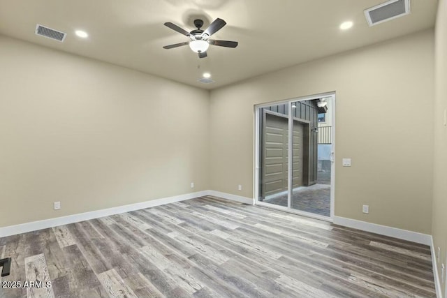 1910 E Rainbow Trl, Payson, AZ 85541 - empty room featuring recessed lighting, wood finished floors, visible vents, and baseboards