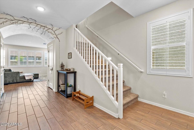 880 S 150th Dr, Goodyear, AZ 85338 - stairway with wood finished floors and arched walkways