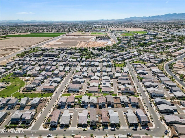 880 S 150th Dr, Goodyear, AZ 85338 - aerial view of property's location with a mountain backdrop and nearby suburban area