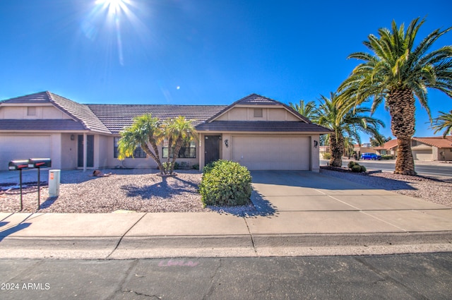 ranch-style house with a garage