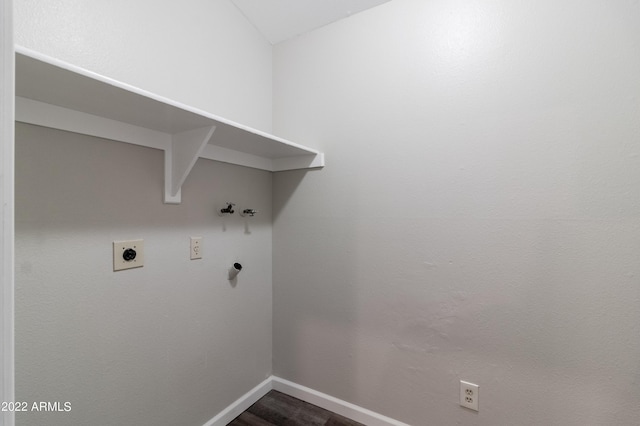 washroom featuring baseboards, dark wood finished floors, laundry area, electric dryer hookup, and washer hookup