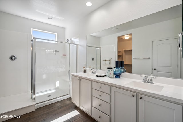 13529 W Remuda Dr, Peoria, AZ 85383 - full bath with a shower stall, double vanity, and wood finished floors