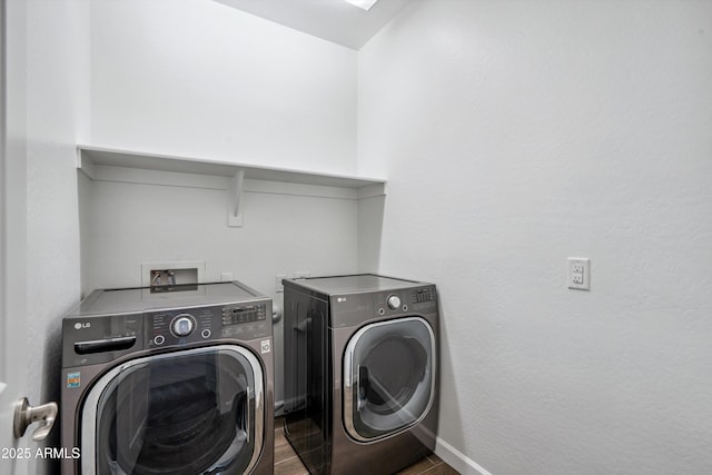 13529 W Remuda Dr, Peoria, AZ 85383 - washroom featuring independent washer and dryer and dark wood finished floors