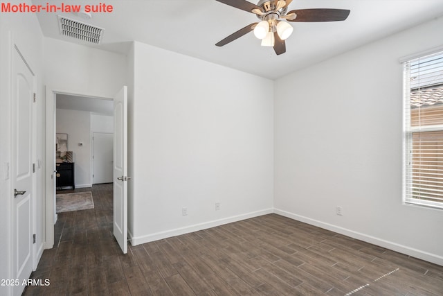 13529 W Remuda Dr, Peoria, AZ 85383 - unfurnished room featuring dark wood-type flooring and a ceiling fan