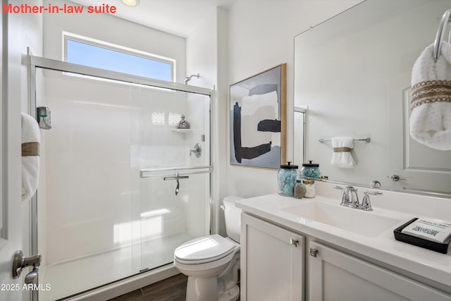 13529 W Remuda Dr, Peoria, AZ 85383 - full bathroom with a shower stall, vanity, and wood finished floors