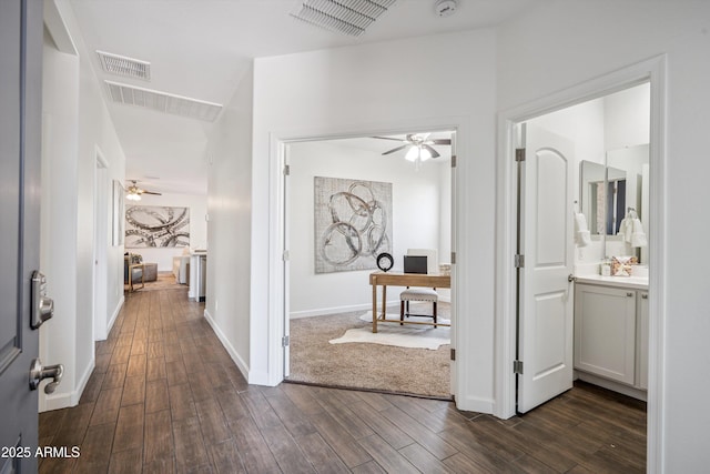 13529 W Remuda Dr, Peoria, AZ 85383 - hallway with an office area and dark wood-type flooring
