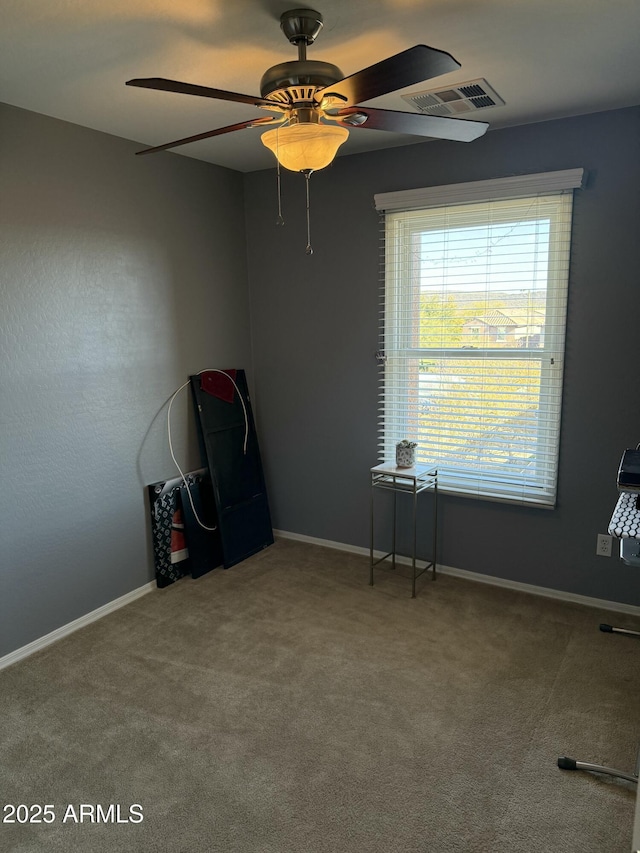 interior space featuring ceiling fan