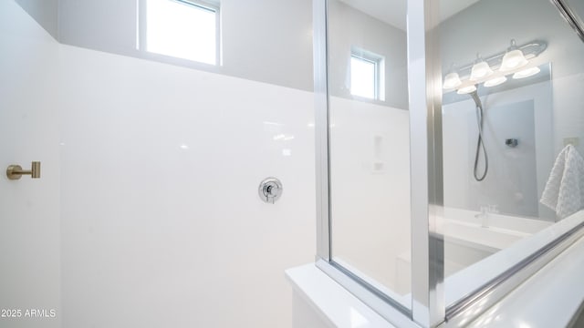 bathroom featuring walk in shower