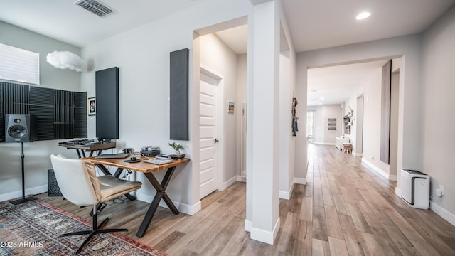 office with recessed lighting, baseboards, visible vents, and light wood finished floors