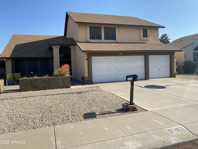 view of front of home with a garage