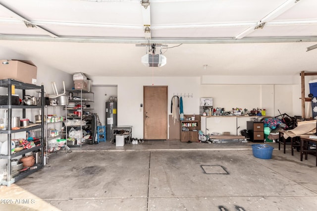 garage with a garage door opener and water heater