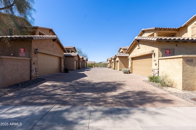 view of road with driveway