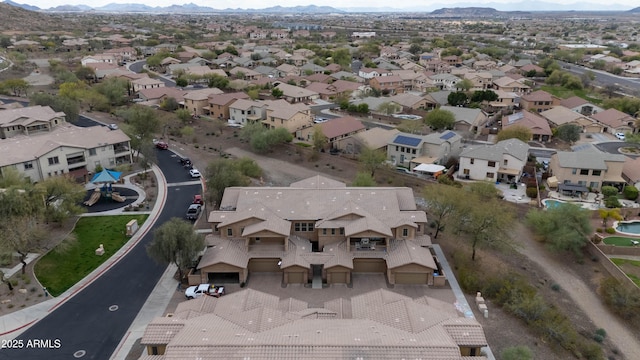 birds eye view of property featuring a residential view and a mountain view