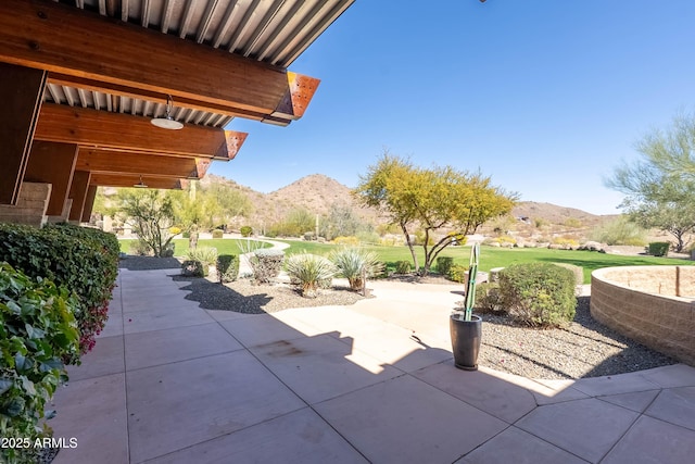 view of patio featuring a mountain view